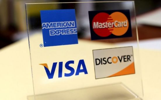 Grandes e Pequenos Comerciantes Aceitam Cartões de Crédito